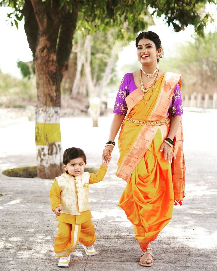 पिवळी कपडे आणि त्यावर दागिने घालून धनश्रीचा मुलगा खूप क्युट दिसत आहे.(फोटो सौजन्य :kadgaonkar_dhanashri/इंस्टाग्राम)