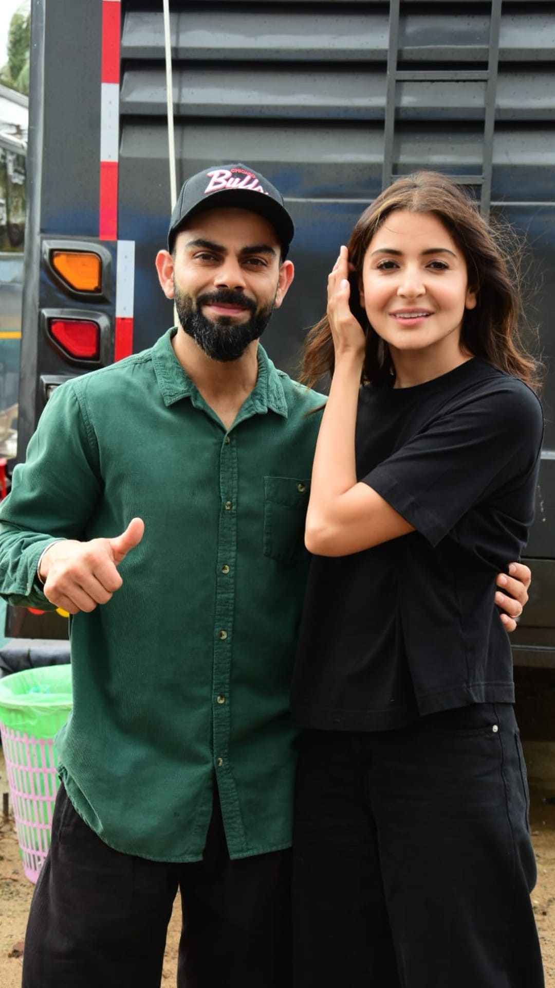 Anushka Sharma and Virat Kohli twin in black and white outfits