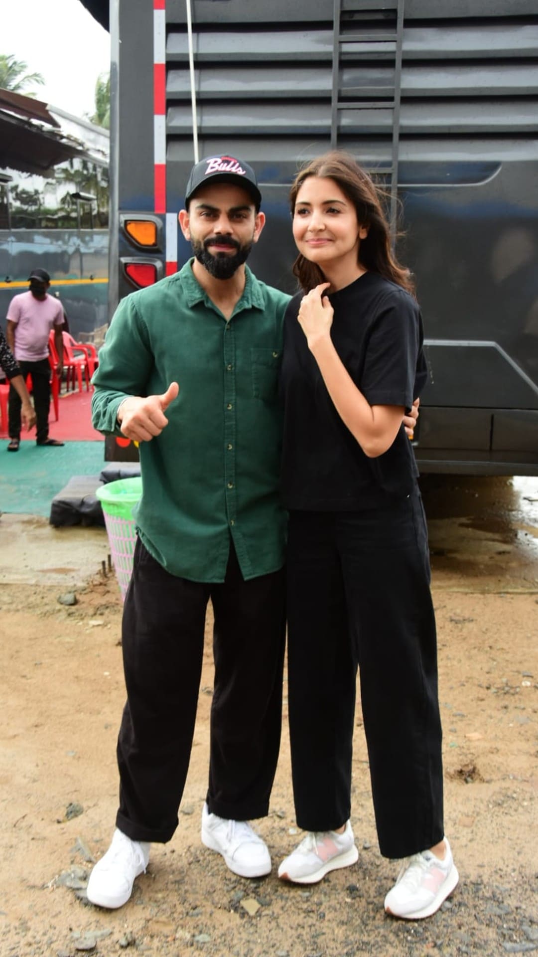 Anushka Sharma and Virat Kohli twin in black and white outfits