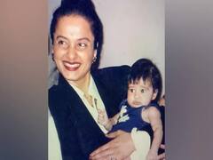 अभिनेत्री रेखा की गोद में बैठी यह क्यूट बच्ची आज है बॉलीवुड की बड़ी एक्ट्रेस, लाखों दिलों पर करती हैं राज़, आपने पहचाना क्या?