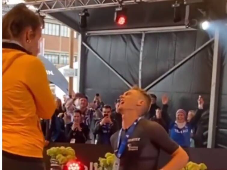 Estonia Man Suffers Severe Leg pain With Proposing to lover, triathlon Internet Admires His Dedication Triathlon Athlete: காதலை சொல்ல வந்தபோது தீவிர காயமடைந்த டிரையத்லான் வீரர்; காதல் ஏற்று கொள்ளப்பட்டதா?