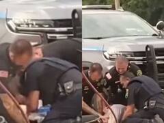 अमेरिका में पुलिस की बेरहमी- शख्स की गर्दन दबाकर लात-घूंसों से पिटाई, तीनों पुलिसवाले सस्पेंड