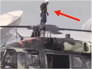 Helicopter ઉપર યુવક બેઠો અને હેલિકોપ્ટર ઉડ્યું, ખતરનાક Stuntનો વીડિયો જોઈને લોકોના હોશ ઉડ્યા