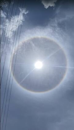 PHOTO : तळपत्या सूर्याला इंद्रधनुष्याने वेढलं, परभणीकरांनी अनुभवला सुखद अनुभव