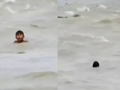 Boy drowning in a river full of crocodiles chiiling viral video Watch Video: ஆற்றில் மூழ்கிய சிறுவன்.. வட்டமிட்ட முதலைகள்.. பதறவைக்கும் வீடியோ!