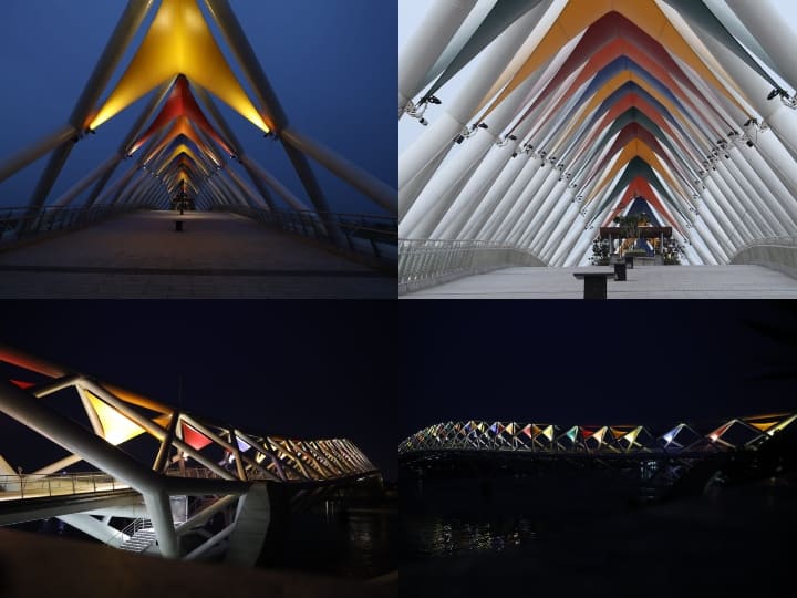 Atal Bridge: प्रधानमंत्री नरेंद्र मोदी (PM Modi) शनिवार (29 अगस्त) को गुजरात के अहमदाबाद शहर में साबरमती नदी पर केवल पैदल चलने वाले अटल ब्रिज (Atal Bridge) का उद्घाटन करेंगे. नगर निगम ने इसका नाम पूर्व प्रधानमंत्री अटल बिहारी बाजपेयी के नाम पर रखा है. आकर्षक डिजाइन और एलईडी लाइटिंग वाला ये पुल बीच में लगभग 300 मीटर लंबा और 14 मीटर चौड़ा है और रिवरफ्रंट के पश्चिमी छोर पर फूलों के बगीचे और पूर्वी पर आने वाले कला और संस्कृति केंद्र को जोड़ता है. अटल ब्रिज पर पैदल चलने वालों के अलावा साइकिल चालक भी इस पुल का इस्तेमाल नदी पार करने के लिए कर सकते हैं.