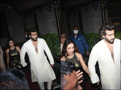 IN PICS: फैशन डिजाइनर कुणाल रावल की शादी में पहुंची Malaika Arora के लिए प्रोटेक्टिव दिखे Arjun Kapoor