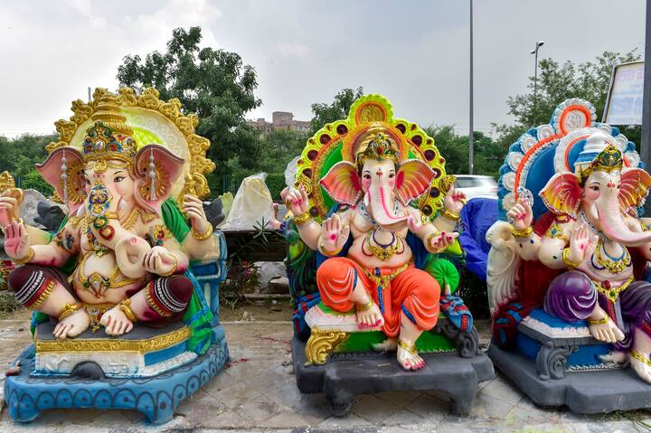Idols of Lord Ganesha being displayed for sale at a roadside stall ahead of the upcoming festival of Ganesh Chaturthi in New Delhi. (Image: PTI)
