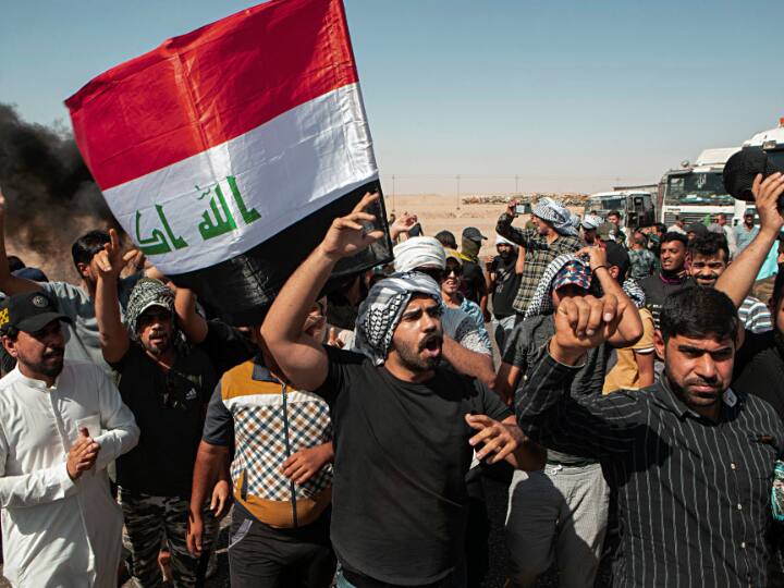 Iraq cabinet shut down government offices due to ongoing curfew Al Kadhimi Iraq Protest: इराक में भड़की हिंसा के बाद सरकारी ऑफिस बंद, प्रधानमंत्री अल कदीमी ने की ये अपील