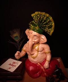 Photo : 'अक्षर गणेश' संकल्पनेवर आधारित आकर्षक शाडू मूर्ती