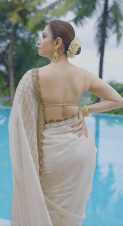 Tamannah: வெள்ளை சேலையில் மனதை கொள்ளை கொள்ளும் நடிகை தமன்னா!