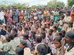 கரூர்: ஆசிரியர் மீது பொய் வழக்கா? - மாணவர்கள், பெற்றோர்கள் பள்ளியின் முன் போராட்டம்