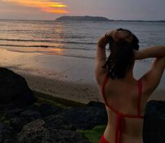 Radhika Madan Pics: रेड बिकिनी में पूल में मस्ती करती दिखीं राधिका मदान, टोंड फिगर देख फैंस कर रहे हैं जमकर कमेंट