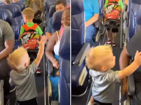 2 year old kid greets every passenger on plane while boarding cute video viral Watch: ਜਹਾਜ਼ 'ਚ ਦਾਖਲ ਹੁੰਦੇ ਹੀ ਹਰ ਯਾਤਰੀ ਨਾਲ ਗੱਲ ਕਰਨ ਲੱਗਾ 2 ਸਾਲ ਦਾ ਬੱਚਾ, ਲੋਕਾਂ ਨੇ ਵੀ ਦਿੱਤਾ ਪਿਆਰ ਨਾਲ ਜਵਾਬ!