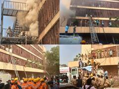 Lucknow Hotel Fire: धुंए का गुबार, पानी की बौछार, खिड़कियों को तोड़कर कुछ यूं बचाई लोगों की जिंदगी, देखें तस्वीरें