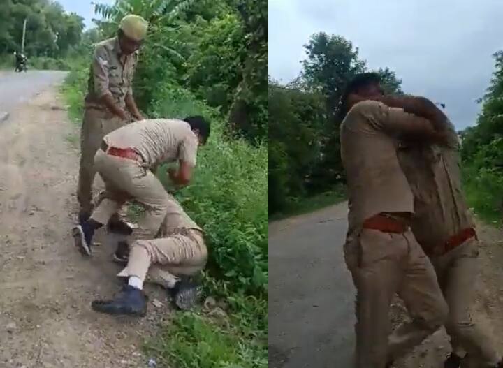 up news jalaun drunk sipahi beat up home guard, kicked and punched, video viral ann Jalaun News: नशे में धुत सिपाही बीच सड़क पर होमगार्ड से भिड़ा, जमकर चले लात-घूंसे, वीडियो वायरल