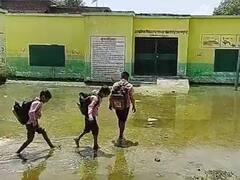 कानपुर में बरसात से हुए जलभराव से स्कूल का हाल बेहाल, बच्चे और टीचर झाड़ियों में शौच करने को मजबूर