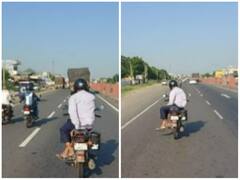 बिजी सड़क पर जानलेवा स्टंट करता नजर आया शख्स, हाथ छोड़कर खतरनाक अंदाज में चलाई बाइक