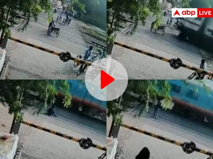 Watch Uttar Pradesh Aligarh Viral Video of rickshaw puller Narrow escape while crossing railway track Watch: मौत के मुंह से बाहर आया रिक्शा चालक! रेलवे ट्रैक पार करते वक्त ही आ गई ट्रेन, फिर...