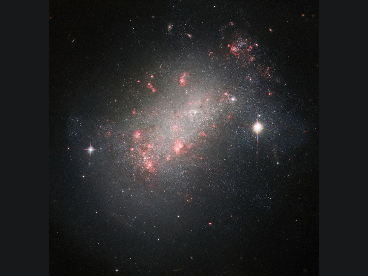 Glittering Gathering Of Stars, Overlapping Spiral Galaxies — Latest Hubble Space Telescope Images