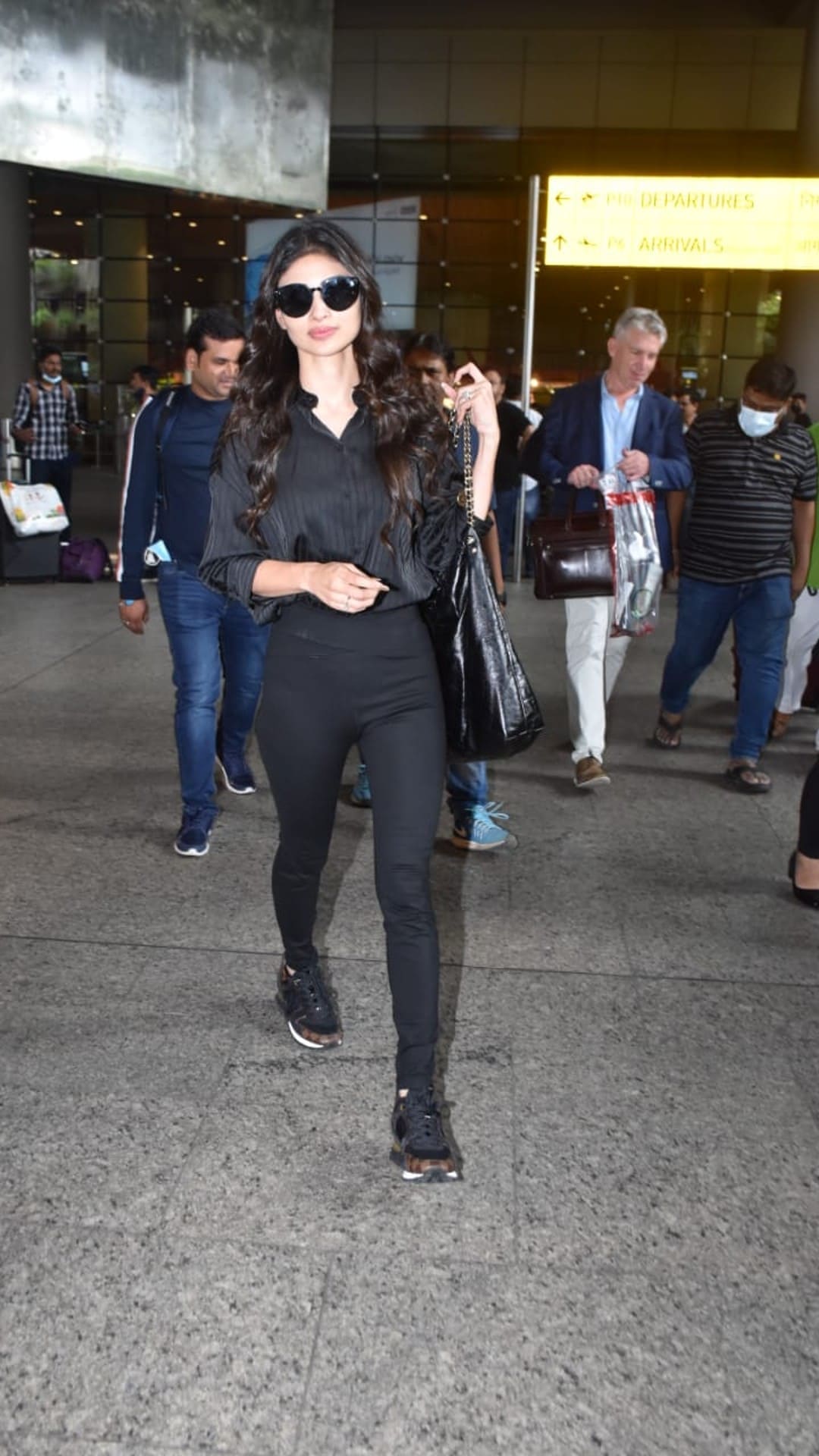 Mouni Roy's All-Black Airport Look Is Complete Not With Her Rs 1.2 YSL  Handbag But Her 67K D&G Sneakers Too