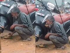 Emotional Video: ਤੇਜ਼ ਬਾਰਿਸ਼ 'ਚ ਸਕੂਟੀ ਹੇਠਾਂ ਲੁਕੋ ਕੇ ਖਾਣਾ ਖਾਂਦੇ ਦੇਖਿਆ ਗਿਆ ਬੇਘਰ, ਰੋਵਾ ਦੇਵੇਗੀ ਇਹ ਵੀਡੀਓ