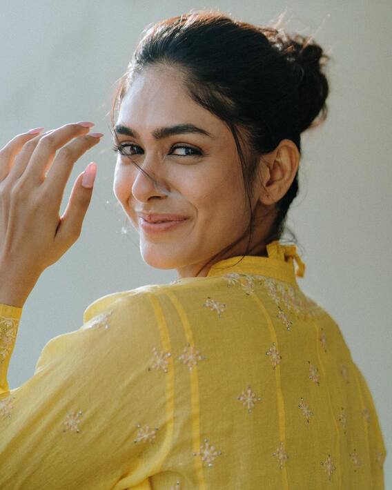 Sita Ramam Starrer Mrunal Thakur Looking Pretty In Yellow Dress, See