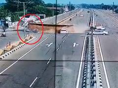 Watch: पत्थरों से लदा ट्रक बीच रोड पर पलटा, नीचे दबी कार, हादसे में तीन लोगों की मौत