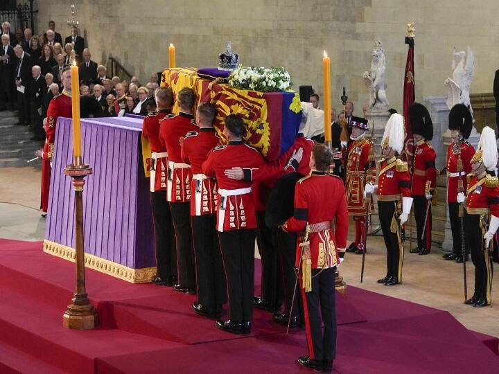 Thousands of people were standing or sitting in line along the banks of the River Thames waiting their turn to file past the coffin and pay their respects. (Source: PTI)