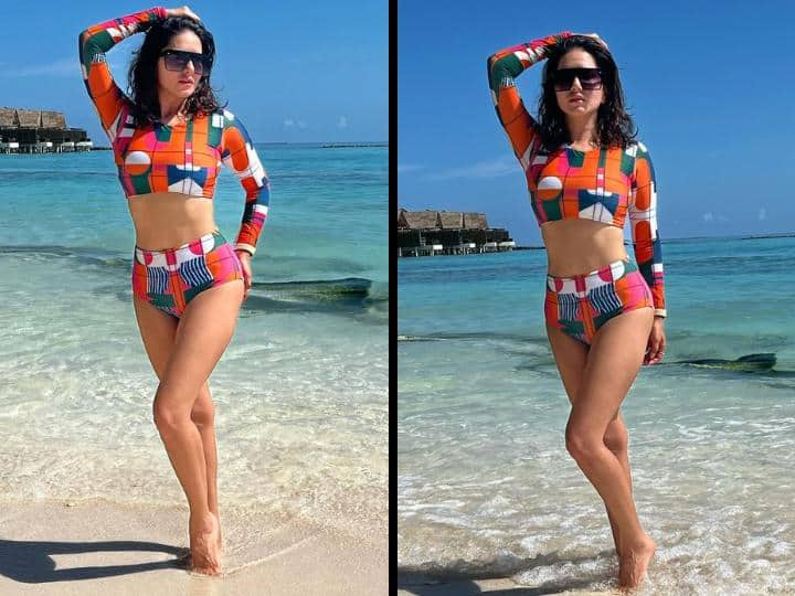 Sunny Leone Latest Pics: बॉलीवुड एक्ट्रेस सनी लियोनी इन दिनों मालदीव ट्रिप के लिए गई हैं. हाल ही में सनी लियोनी की लेटेस्ट बिकिनी तस्वीरें सोशल मीडिया पर सामने आईं हैं.