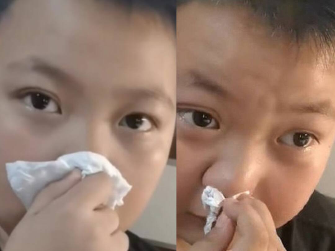 school boy from China says he is allergic to the smell of book Video : ”புத்தக வாசனையே அலர்ஜிங்க எனக்கு...” : ஹோம் ஒர்க் செய்ய மறுத்து கம்பிகட்டிய க்யூட் சிறுவன்..