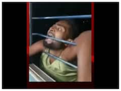 Thief Tries To Snatch Phone From Moving Train, Dangles From Window As Passengers Grab His Arms. Watch Video