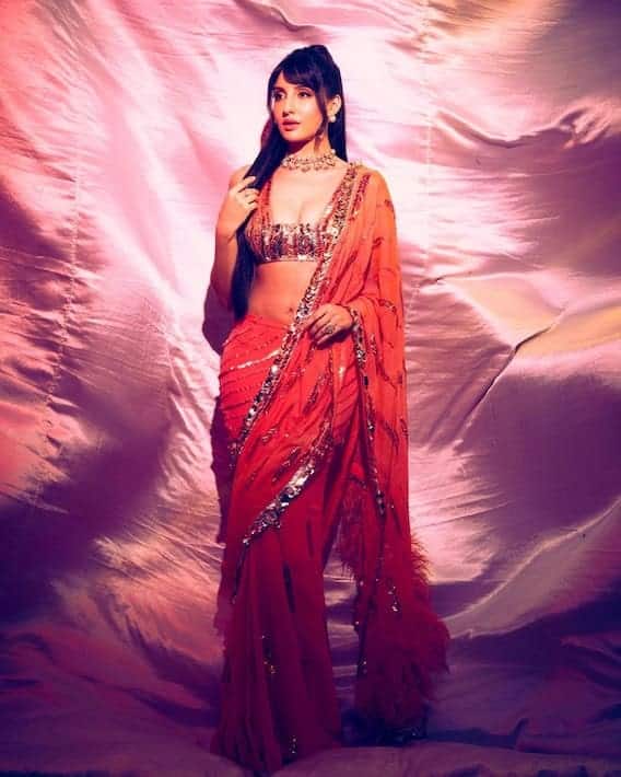 ફિલ્મ 'થેન્ક ગૉડ' (Thank God) માં નોરા ફતેહી (Nora Fatehi) એક આઇટમ નંબરમાં દેખાશે. જેને લઇને એક્ટ્રેસના ફેન્સ પણ ખુબ ઉત્સાહિત છે.