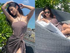 Mouni Roy Pics: थाई स्लिट ड्रेस में मौनी रॉय ने समंदर किनारे बिखेरी अदाएं, काउच पर किया चिल तो कभी फ्लॉन्ट किए लेग्स
