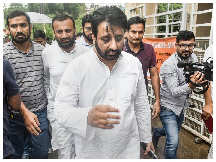 Delhi Police Raids AAP MLA Amanatullah Khan House Illegal Weapon Cash Seized AAP MLA Amanatullah Khan Arrested In Delhi Wakf Board Corruption Case