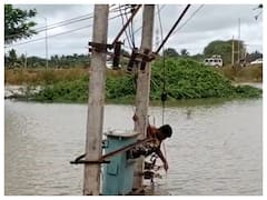 Karnataka: Lineman Swims Through Floodwater To Switch On Transformer. Video Goes Viral