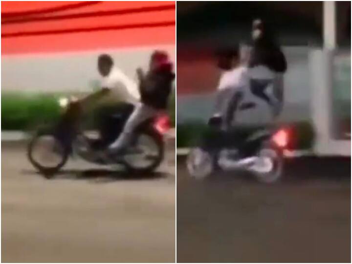 motorcycle stunt girl jumped over 4 feet above bike seat amazed viral video चलती बाइक पर 4 फीट ऊपर हवा में उछली लड़की, Video देख आंखों पर नहीं होगा यकीन
