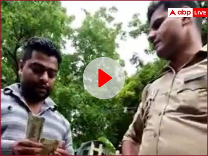 Noida Police asked for 25 thousand to be released on false charges of smuggling video viral ann Noida News: तस्करी के झूठे आरोप में फंसाकर छोड़ने के लिये पुलिस ने मांगा 25 हजार, घूस लेते वीडियो हुआ वायरल