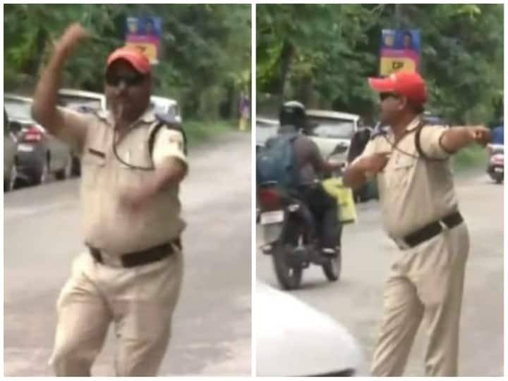 dehradun home guard jogendra kumar controlling traffic in unique way marathi news Viral Video : वाहतूक नियंत्रित करताना एका पोलिसाची खास शैली; सोशल मीडियावर व्हिडीओ व्हायरल