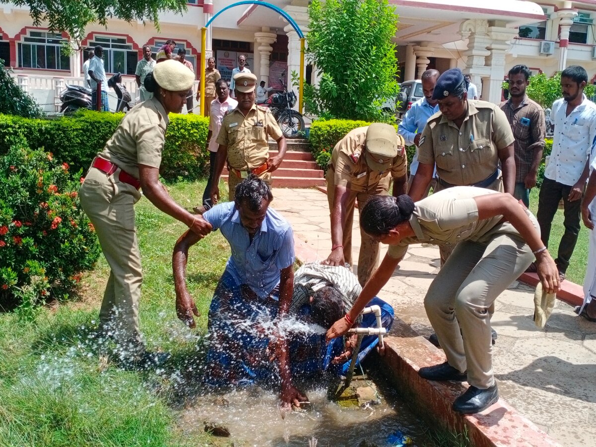 திருவண்ணாமலை ஆட்சியர் அலுவலகத்தில் ஒரே குடும்பத்தை சேர்ந்த சகோதரர்கள்  தீக்குளிக்க முயற்சி