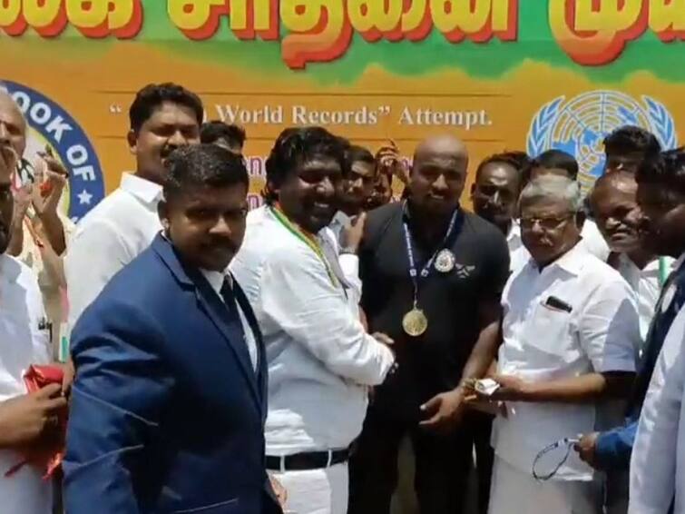 Kanyakumari: Strong Man Kannan pulls the 13.5 truck by rope sets world record கன்னியாகுமரியில் 13.5 டன் லாரியை கயிற்றால் இழுத்து உலக சாதனை