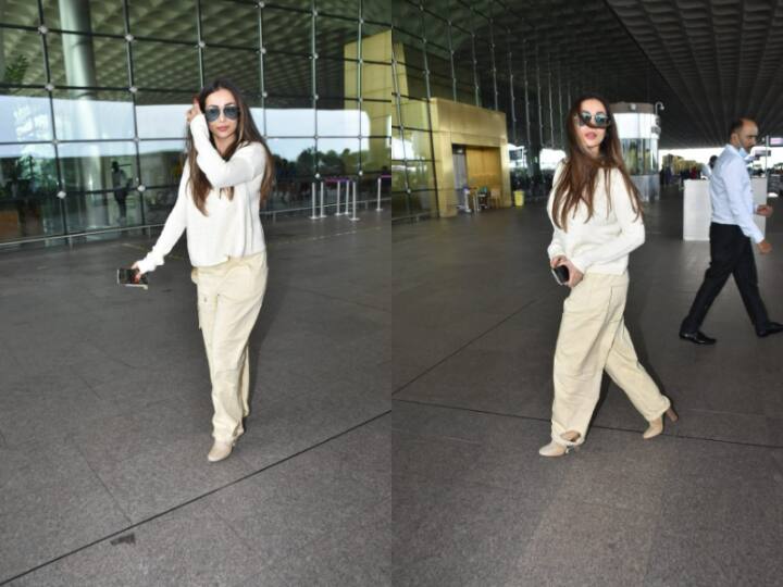 Malaika Arora was spotted at the airport in a cream pullover and beige track pants and heels. Check out pics