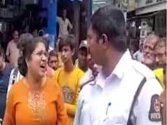 'నా కారుకే చలానా రాస్తారా' అంటూ ట్రాఫిక్ పోలీసులపై మహిళ ఫైర్