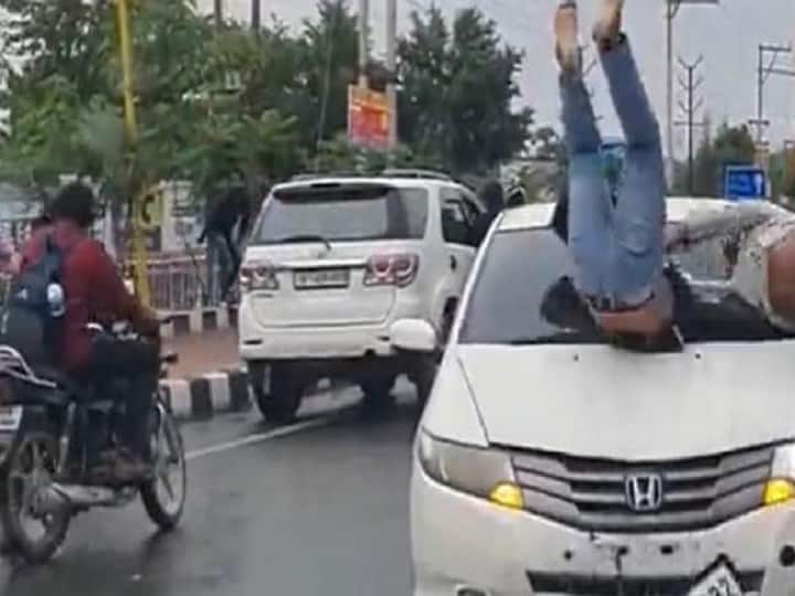 Uttar Pradesh Speeding Car rams into College students Clashing outside college Ghaziabad FIR Viral Video UP Police Speeding Car Rams Into Fighting Students Outside Ghaziabad College, But Brawl Continues. Watch Video