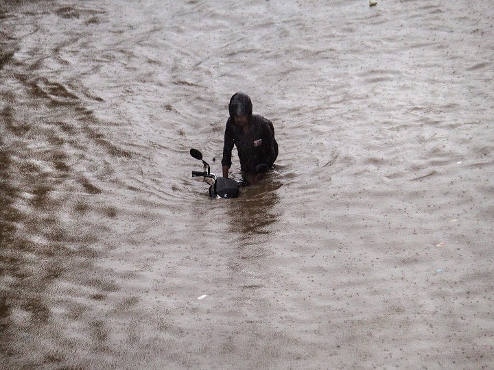 The rains also led to a sharp spike in cab and autorickshaw fares, as they manned their vehicles through waterlogged roads and obstructions caused by uprooted trees. (Image: PTI)