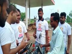 Birbhum News: 'কেন্দ্র ৫০ টাকা বেশি নিচ্ছে বলেই পেট্রোলের দাম ১০৬', পাপ্পু টি-শার্ট পরে প্রতিবাদ তৃণমূলের