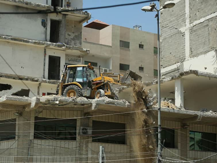 Bulldozers Demolish Encroachments At Noida Grand Omaxe Complex Of Jailed Politician Shrikant Tyagi Bulldozers Demolish Encroachments At Noida Housing Complex Of Jailed Politician Shrikant Tyagi. Watch Video