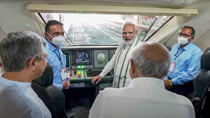 Prime Minister Narendra Modi with Union Minister for Railways Ashwini Vaishnaw, Gujarat Chief Minister Bhupendra Patel and others aboard the Gandhinagar-Mumbai Vande Bharat Express train. (Source: PTI)