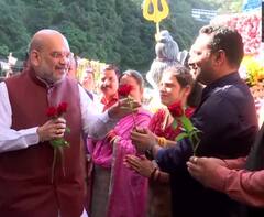 जम्मू-कश्मीर दौरे के दूसरे दिन अमित शाह ने किया माता वैष्णो देवी के दर्शन, गुलाब के फूल से लोगों ने किया स्वागत, देखें Pics