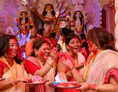 ঢাকের বোলে উমা-বিদায়ের সুর, মন খারাপের মাঝে শুভেচ্ছা বিনিময়, প্রণাম, কোলাকুলি, মিষ্টিমুখের পালা